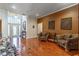 Warm, inviting sitting area with hardwood floors and decorative accents at 2538 Carter Grove Cir, Windermere, FL 34786