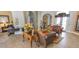 The elegant lobby boasts comfortable leather sofas, decorative floral arrangements, and tiled floors at 2545 Old Kent Cir, Kissimmee, FL 34758