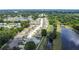 Serene aerial view of a planned community with lakes, mature trees, and well-maintained landscaping at 2724 Shelby Ruth Pl, St Cloud, FL 34769