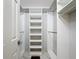 Spacious walk-in closet with built-in shelving for ample storage at 2724 Shelby Ruth Pl, St Cloud, FL 34769