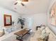 Spacious living room with neutral paint, ceiling fan, and elegant decor at 2724 Shelby Ruth Pl, St Cloud, FL 34769