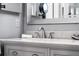 Close up on a modern bathroom sink, featuring a white marble countertop at 2832 Buccaneer Dr, Winter Park, FL 32792