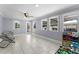 Bright living room with tile floors and plenty of natural light at 2832 Buccaneer Dr, Winter Park, FL 32792