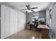 Bright office space with dual monitors and ample storage, creating an ideal workspace in the home at 2832 Buccaneer Dr, Winter Park, FL 32792