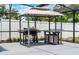 Well-equipped outdoor kitchen area featuring a grill and preparation space at 2832 Buccaneer Dr, Winter Park, FL 32792