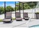 Relaxing screened patio with comfortable lounge chairs and a serene fountain feature at 2832 Buccaneer Dr, Winter Park, FL 32792