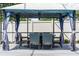 Outdoor dining area in a screened-in pool area at 2832 Buccaneer Dr, Winter Park, FL 32792