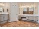 Spacious bathroom boasts double vanities, ample storage, and stylish tile flooring at 2880 Old Castle Dr, Winter Park, FL 32792