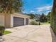 Spacious three car garage with extended driveway for extra parking at 2880 Old Castle Dr, Winter Park, FL 32792