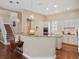 Kitchen with granite countertops and a breakfast bar that leads into the living areas at 2880 Old Castle Dr, Winter Park, FL 32792