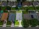 Aerial view of a well-maintained single-Gathering home with a lush green lawn in a vibrant neighborhood at 298 Clydesdale Cir, Sanford, FL 32773