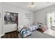 Charming bedroom features a cheerful decor, bright lighting, and a spacious closet at 298 Clydesdale Cir, Sanford, FL 32773