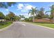 Entrance to Baker's Crossing features a well-maintained brick sign and manicured landscaping at 298 Clydesdale Cir, Sanford, FL 32773