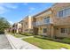 Attractive multi-level townhomes boast private balconies, stone accents, and a well-maintained community at 3149 Brasilia Ave, Kissimmee, FL 34747