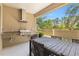 Well-appointed outdoor kitchen and dining area with granite countertops at 3149 Brasilia Ave, Kissimmee, FL 34747