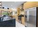 Well-equipped kitchen features stainless steel appliances, a granite countertop, and stylish cabinetry at 3149 Brasilia Ave, Kissimmee, FL 34747