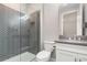 Stylish bathroom features tiled shower, modern fixtures, and sleek design at 31792 Broadwater Ave, Leesburg, FL 34748