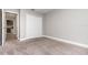 Bedroom featuring neutral walls, carpet, and a closet at 31792 Broadwater Ave, Leesburg, FL 34748
