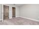 Carpeted bedroom with closet at 31792 Broadwater Ave, Leesburg, FL 34748