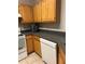 Close-up of a bright kitchen featuring a dishwasher and ample countertop space at 3417 Westchester Square Blvd # 202, Orlando, FL 32835