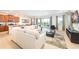 Open-concept living and dining area with tile floors and sliding glass doors to the patio at 408 Southfield St, Kissimmee, FL 34747