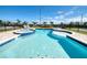 Resort-style pool and jacuzzi with lounge chairs and lush landscaping perfect for outdoor relaxation at 408 Southfield St, Kissimmee, FL 34747