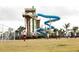 playing soccer in front of a thrilling waterpark tower and slide at 408 Southfield St, Kissimmee, FL 34747