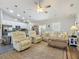 Open-concept living room with kitchen view at 439 Lake Daisy Dr, Winter Haven, FL 33884