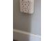 Six-outlet wall-mounted electrical outlet with decorative wall texture and a white trim at 439 Lake Daisy Dr, Winter Haven, FL 33884