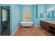Spacious bathroom with a standalone tub, glass-enclosed shower, and vanity with double sinks at 4823 Shoreline Cir, Sanford, FL 32771