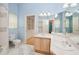 Traditional bathroom featuring double sink vanity, large mirror, walk-in closet and tile flooring at 4823 Shoreline Cir, Sanford, FL 32771