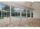 Relax or take a dip in this home's private pool and patio at 4823 Shoreline Cir, Sanford, FL 32771