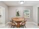 Dining area offering neutral paint and lots of light from a window at 536 W King St, Orlando, FL 32804