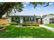 Charming single story home with a well manicured lawn and cozy curb appeal at 536 W King St, Orlando, FL 32804