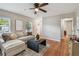 This living room offers hardwood floors, neutral paint, and lots of natural light at 536 W King St, Orlando, FL 32804