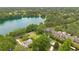 Aerial shot of a lakeside home with lush greenery, offering a serene and picturesque setting with stunning lake views at 614 Lake Ave, Orlando, FL 32801