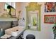 Stylish bathroom features decorative mirror, square vessel sink, and elegant fixtures at 614 Lake Ave, Orlando, FL 32801
