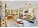 Open kitchen layout with island seating, stainless steel appliances, and pendant lighting at 614 Lake Ave, Orlando, FL 32801