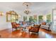 Elegant living room featuring gleaming hardwood floors, sophisticated decor, and plenty of natural light at 614 Lake Ave, Orlando, FL 32801