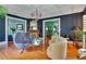 Beautiful living room with hardwood floors, stylish furniture, and an ornate fireplace at 614 Lake Ave, Orlando, FL 32801