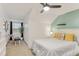 Bright bedroom showcases a desk and bed, creating a functional and inviting retreat at 6527 Silver Queen Way, Windermere, FL 34786