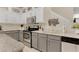 Well-equipped kitchen featuring granite countertops, stainless steel appliances, and ample cabinet space at 6527 Silver Queen Way, Windermere, FL 34786