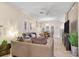 Comfortable living room with stylish furnishings, decorative accents, and a bright dining area in the background at 6527 Silver Queen Way, Windermere, FL 34786