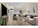 Cozy living room with comfortable seating, modern decor, and ample natural light at 6527 Silver Queen Way, Windermere, FL 34786