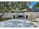 Beautiful backyard featuring a patio, swing and manicured landscaping perfect for relaxation at 719 Stevelynn Cir, Winter Garden, FL 34787