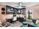 Charming home office with built-in shelving, stylish desk, and plenty of natural light at 719 Stevelynn Cir, Winter Garden, FL 34787