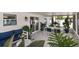 Inviting screened patio with stylish tile flooring and comfortable seating at 719 Stevelynn Cir, Winter Garden, FL 34787