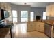 Spacious kitchen with white cabinets, granite countertops, and an eat-in area perfect for casual dining at 8025 Old Town Dr, Orlando, FL 32819