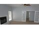 Bright living room with fireplace, neutral carpet and lots of space at 8025 Old Town Dr, Orlando, FL 32819