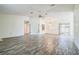 Spacious living room features stylish floors, ceiling fan, and natural light creating an inviting atmosphere at 8426 Sw 114Th St, Ocala, FL 34481